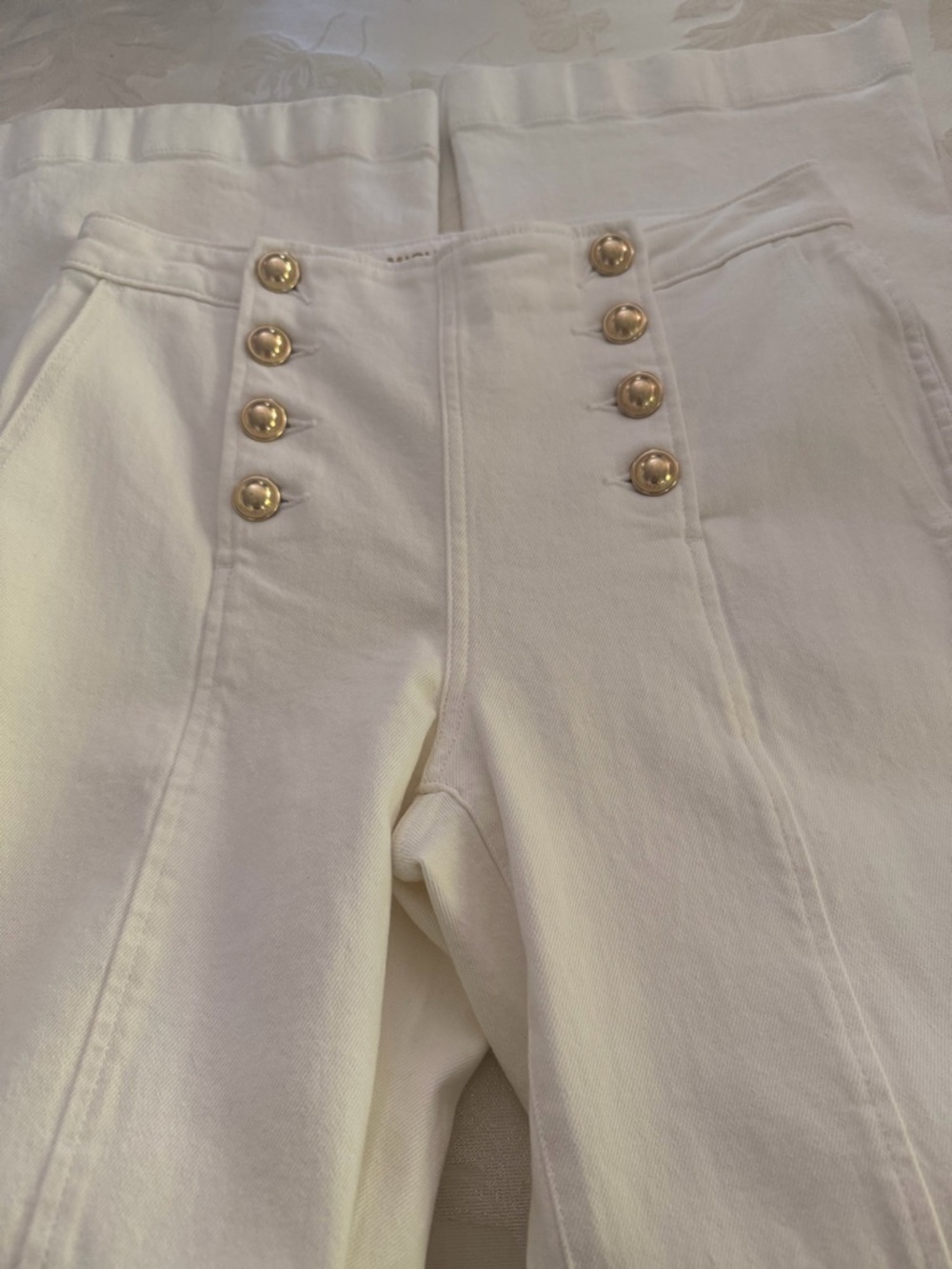 Michael Kors Sailor High Rise Flared leg jeans with gold hardware